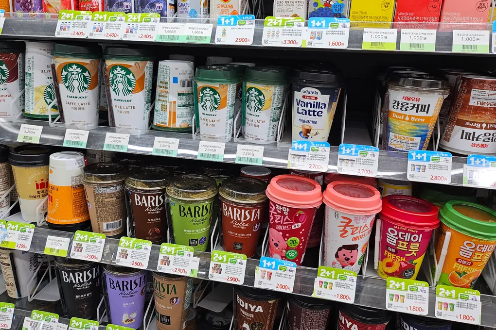 Refrigerated cup coffees including Starbucks and Barista brands at a Korean convenience store