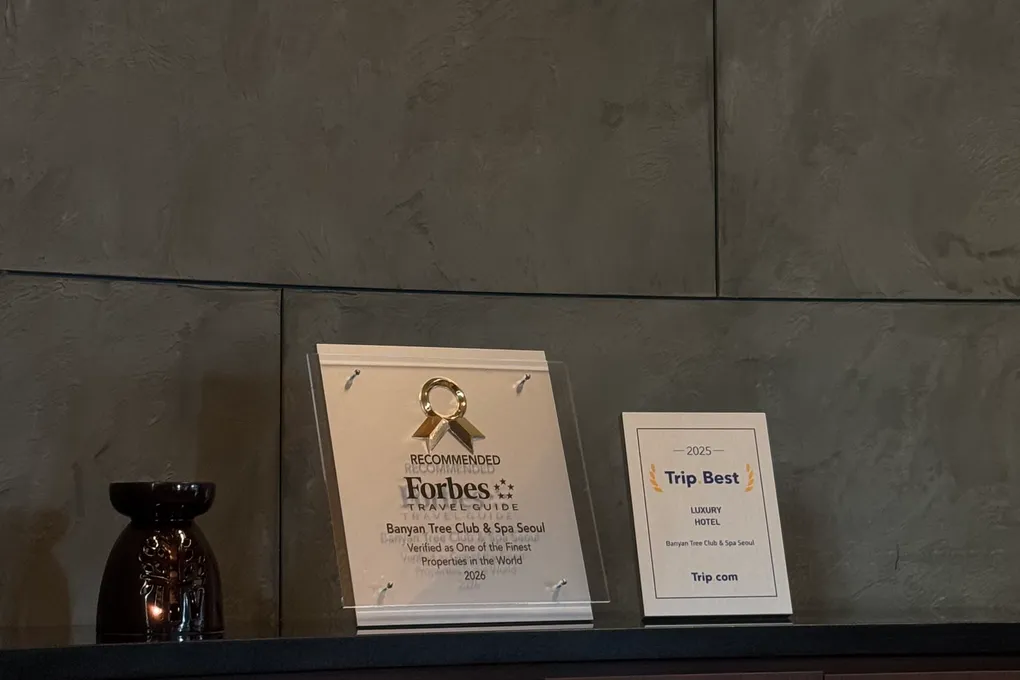 Forbes Travel Guide and Trip.com Best Luxury Hotel awards displayed at Banyan Tree Seoul