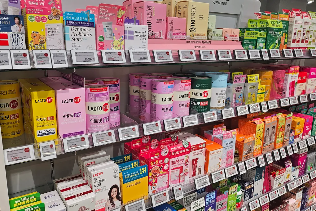 Health supplement shelves at Olive Young including Lacto-Fit probiotics
