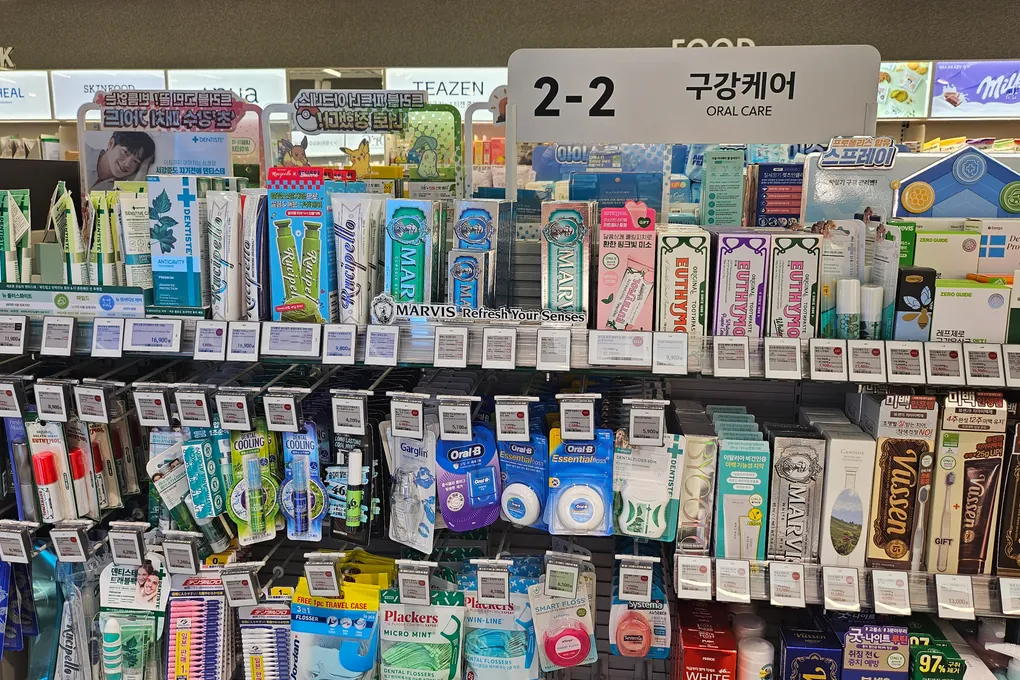 Oral care aisle at Olive Young with Korean toothpastes and dental products