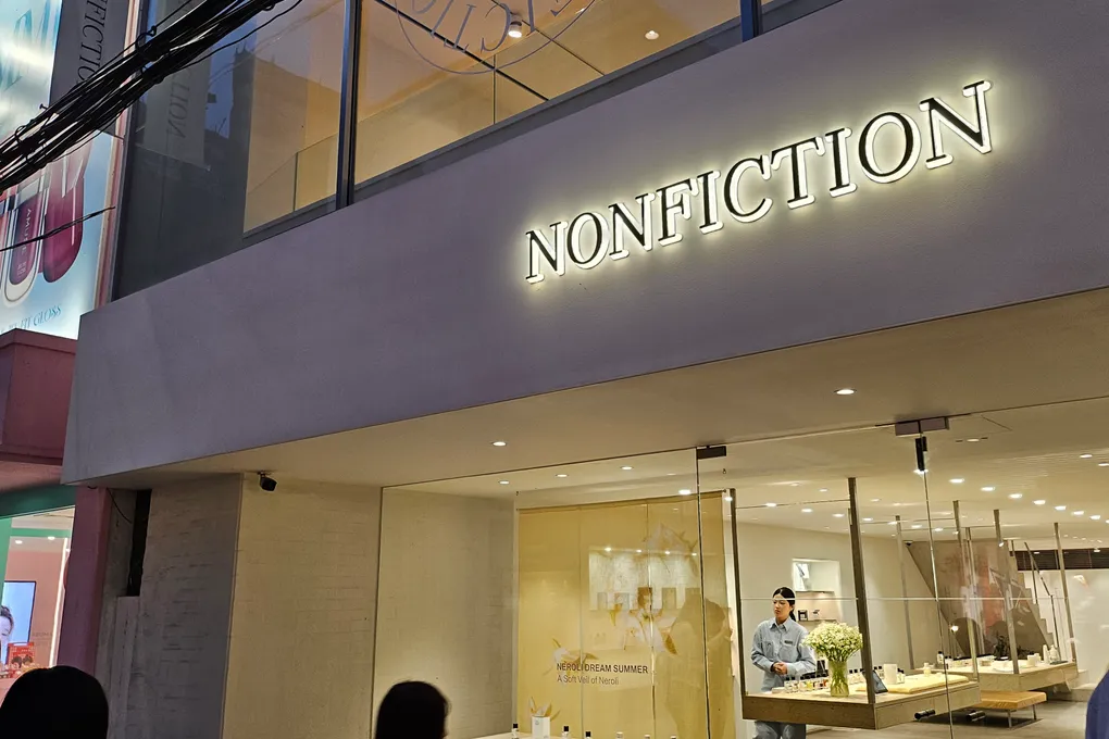 The NONFICTION fragrance flagship store in Seongsu, brightly lit at night