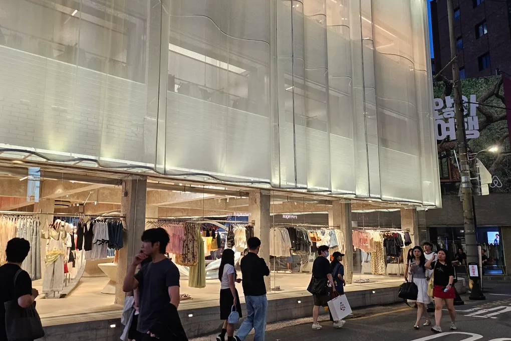 A modern concrete and glass design store on Yeonmujang-gil in Seongsu