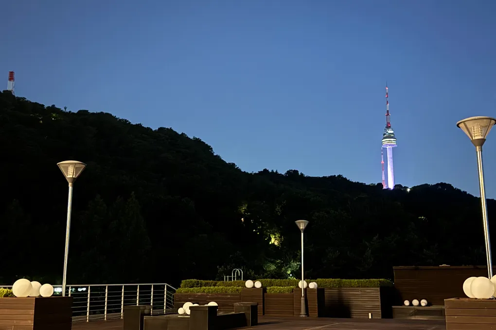 Open deck at Banyan Tree Seoul at night looking toward the illuminated N Seoul Tower